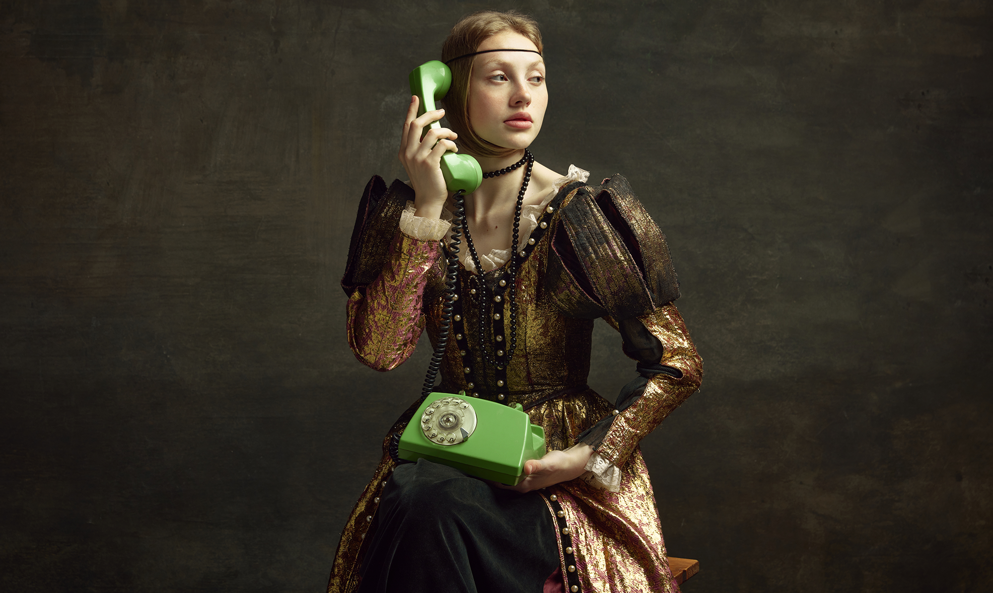 Medieval woman on a telephone